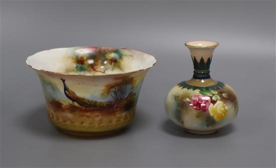 A Royal Worcester small bowl painted with peacock and pine cones by F. J. Bray and a Hadleys Worcester vase tallest 10cm